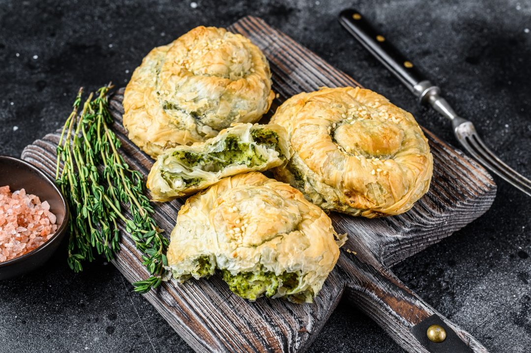 baked spanakopita spiral filo pastry puff pie with feta cheese and spinach 1 1