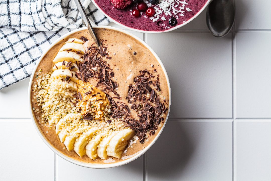 chocolate smoothie bowl with banana peanut butter and hemp seeds